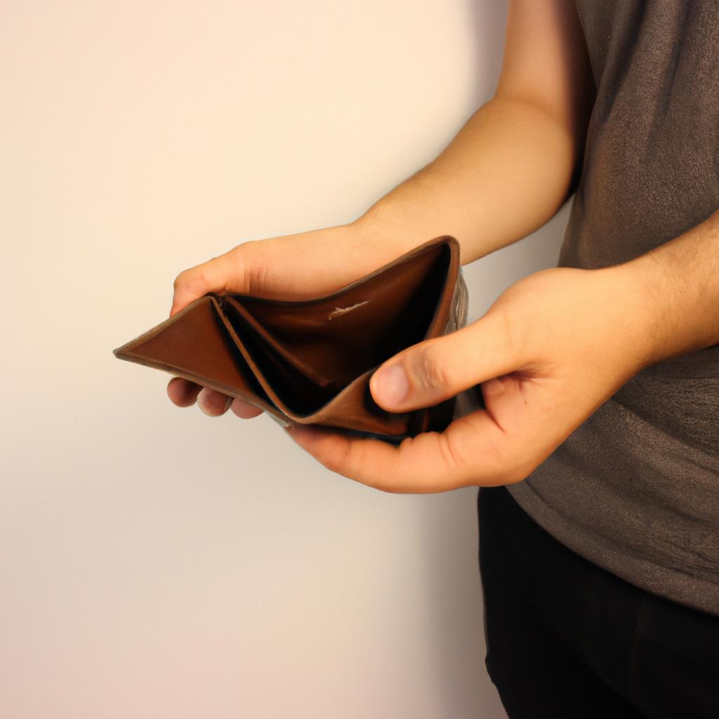 Person holding empty wallet, contemplating